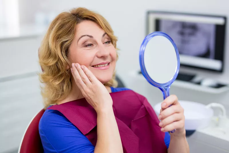 Dentist_Ashburn_VA_dental-implants-patient-smiling-after-procedure Dentist_Ashburn_VA_dental-implants-patient-smiling-after-procedure